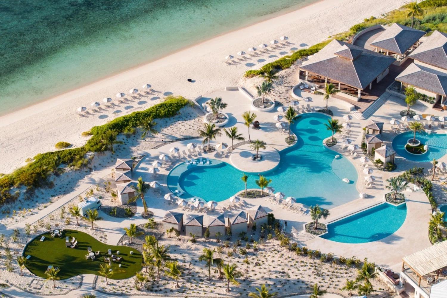 Aerial view of the Salterra pool complex, beach, and clubhouse on South Caicos.